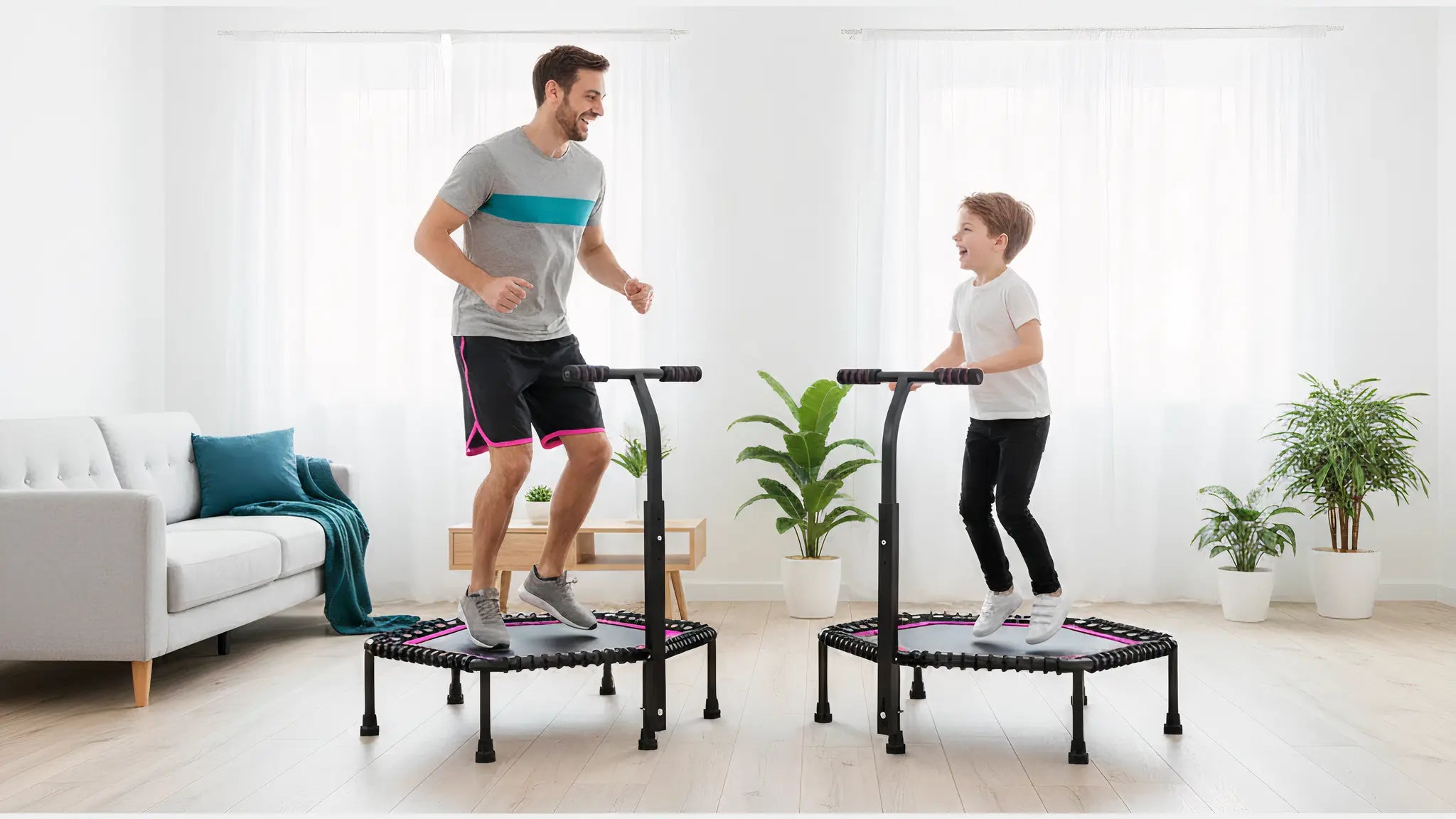 Father and son bouncing together on fitness rebounders with handlebars in bright living room