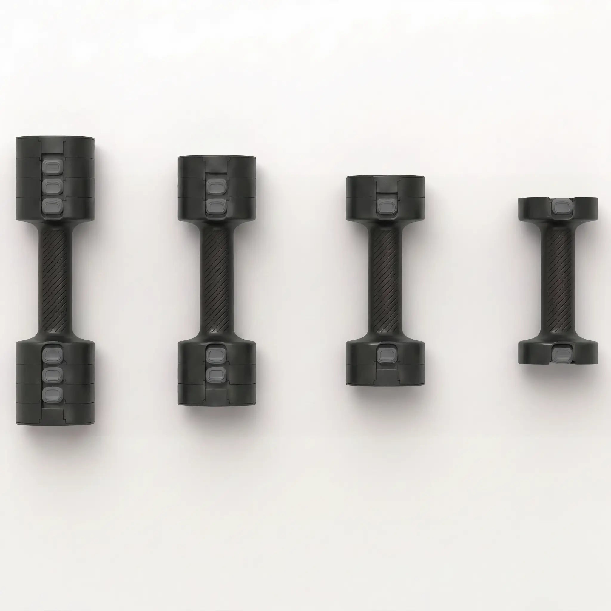 Adjustable dumbbell shown in different weight configurations