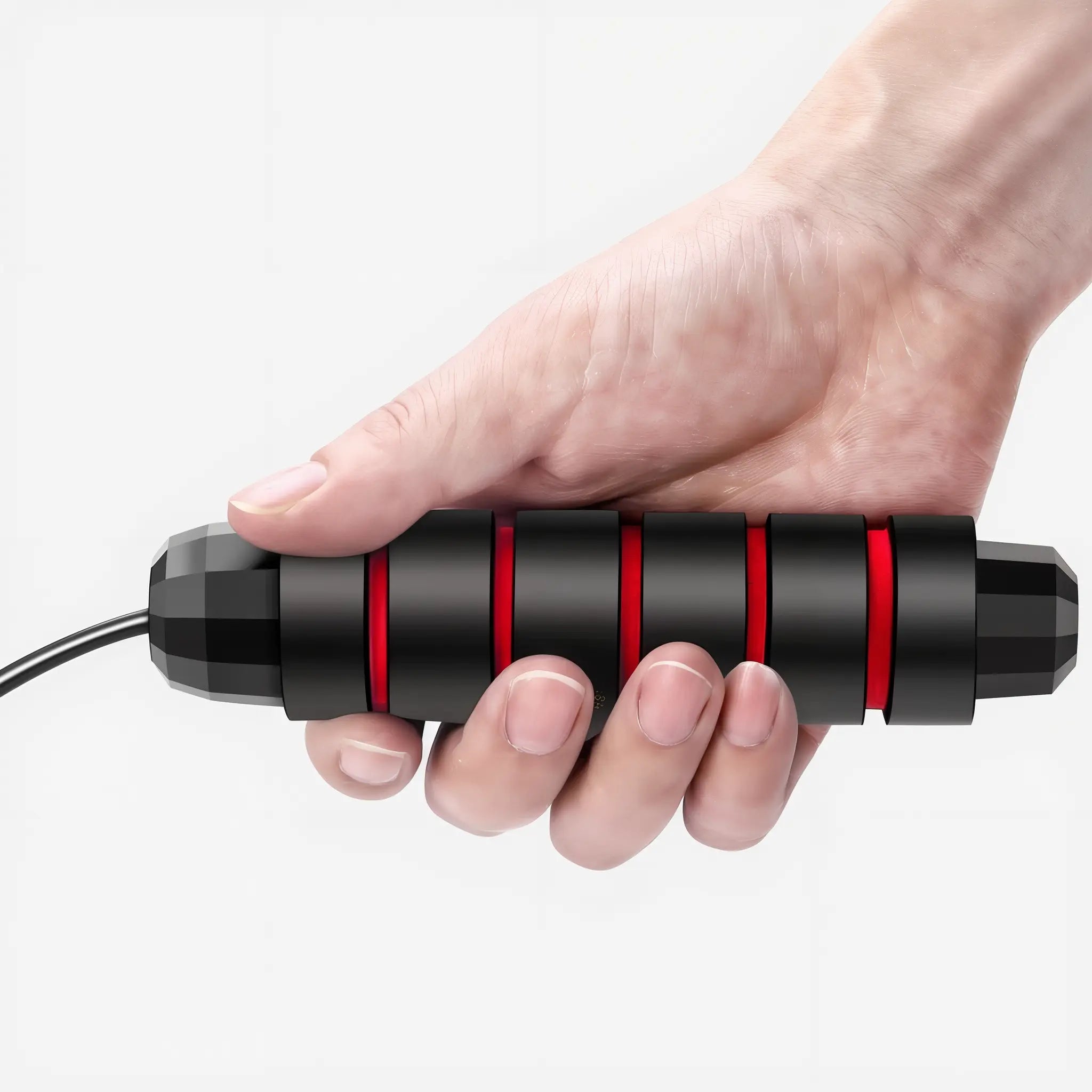 Close-up of adjustable skipping rope handle with textured foam grip