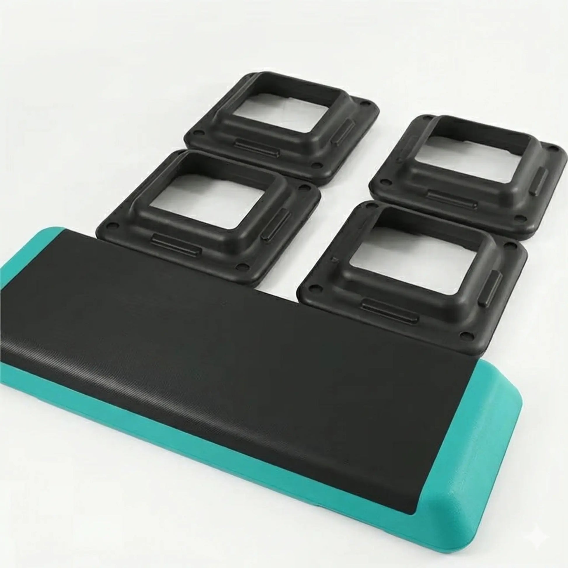 Black and turquoise step platform with four square black platforms on a white background