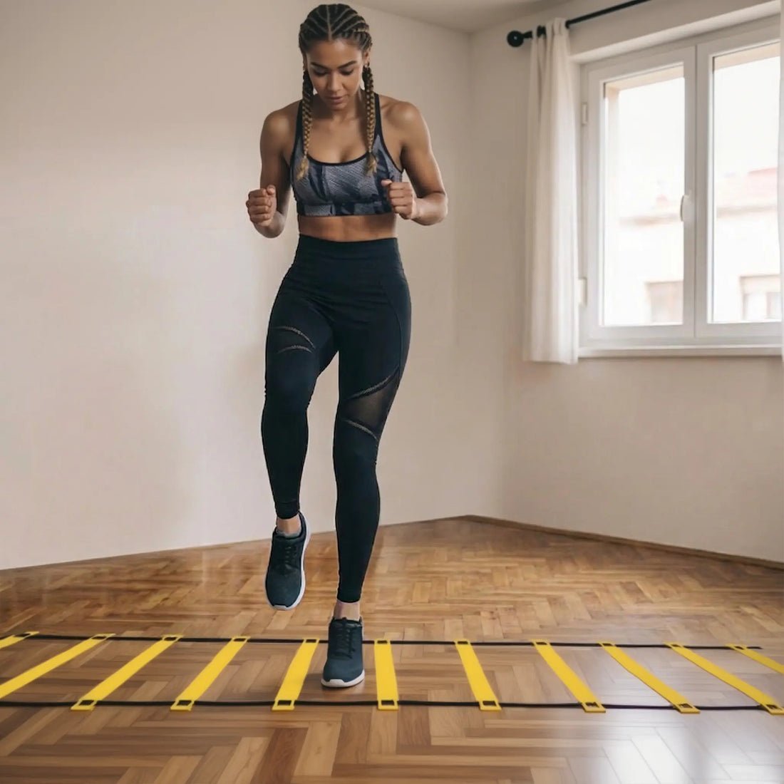 Adjustable agility ladder fanned out showing all rungs and nylon straps