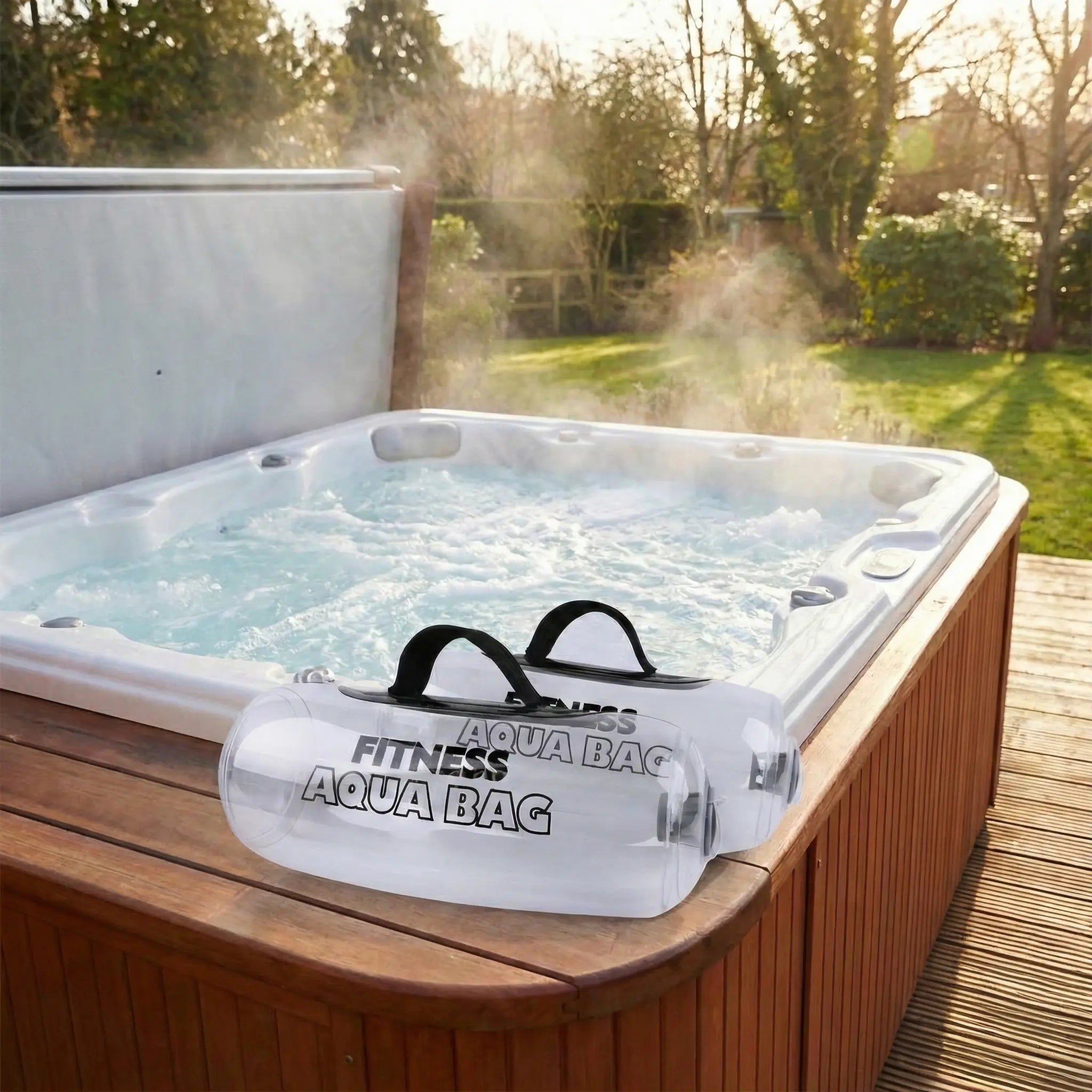 Portable water-filled aqua dumbbell resting outdoors, empty and ready for travel