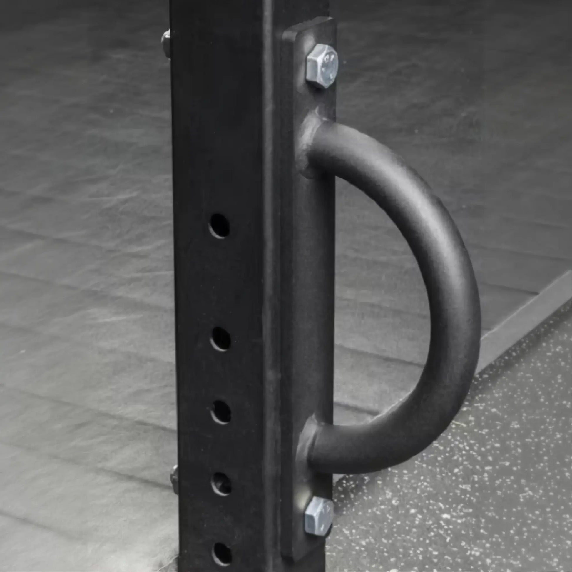 Side view of battle rope anchor fitted to power rack upright