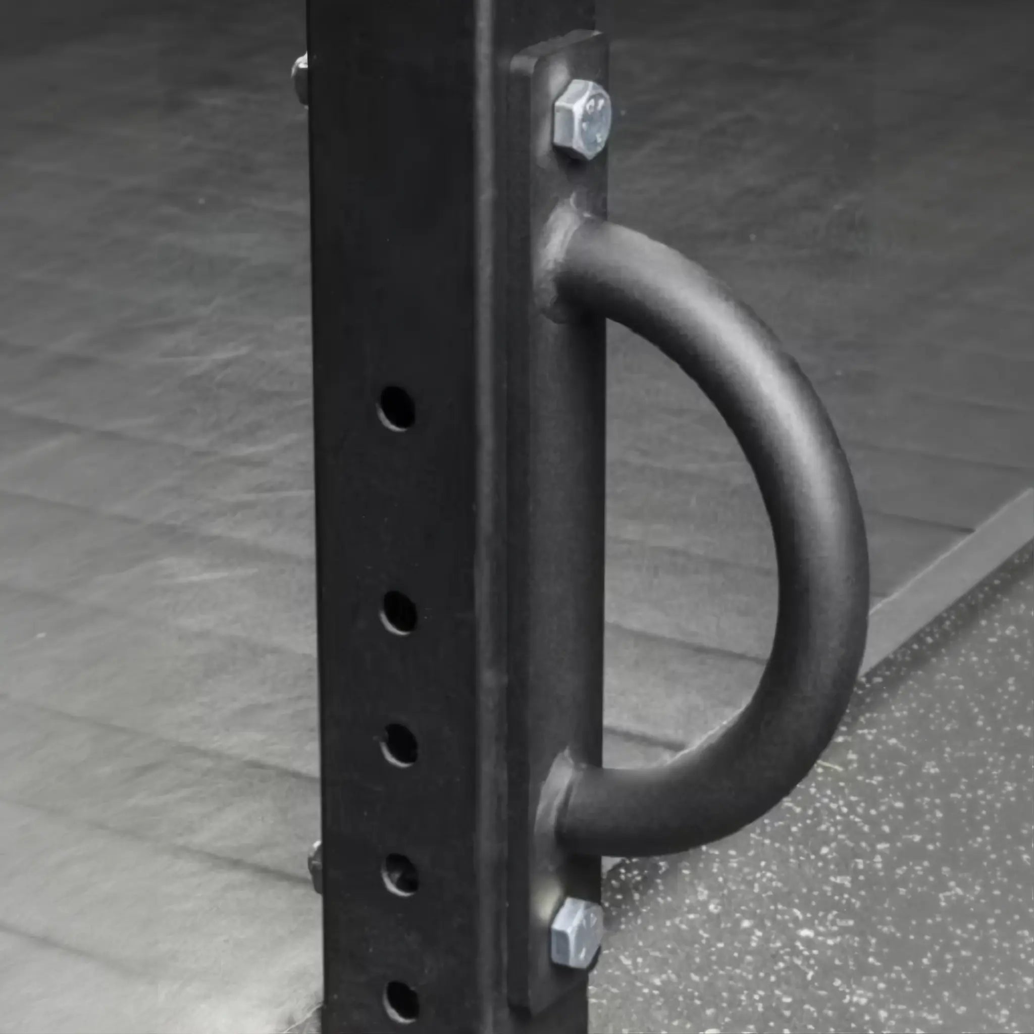 Side view of battle rope anchor fitted to power rack upright
