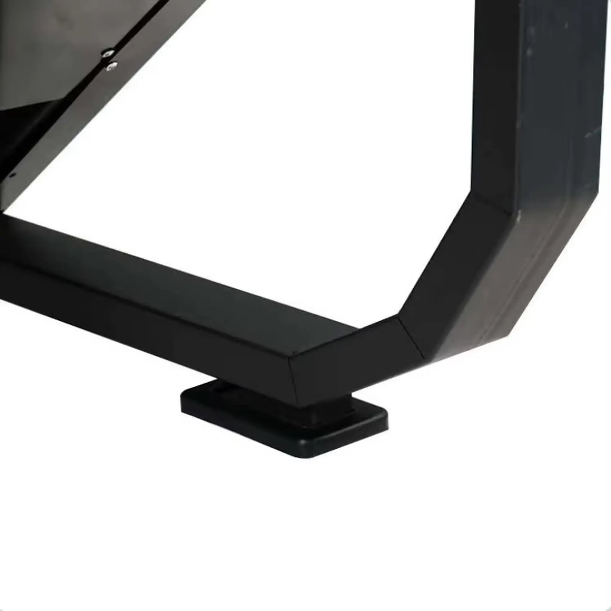 Close-up of stair climber focusing on black metal frame and wide stable feet