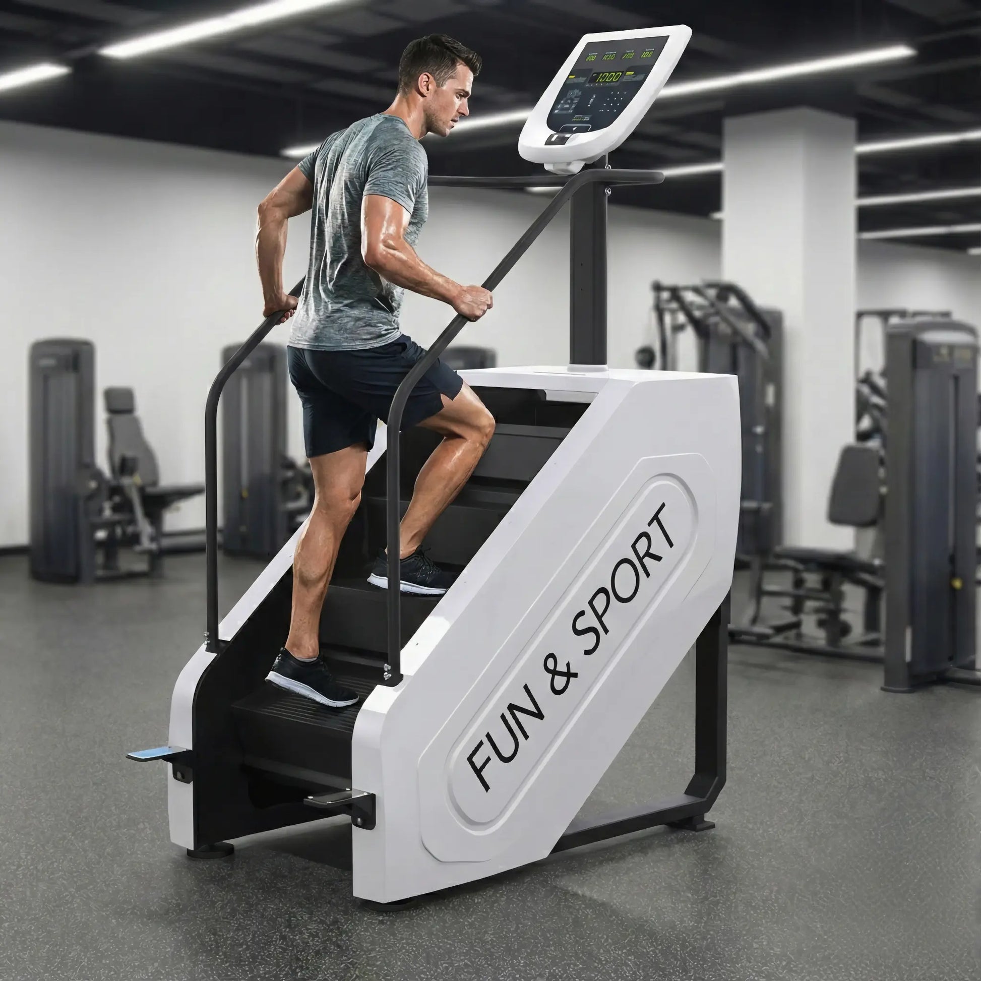 Man exercising on a stair stepper machine in a gym with 'FUN & SPORT' branding.