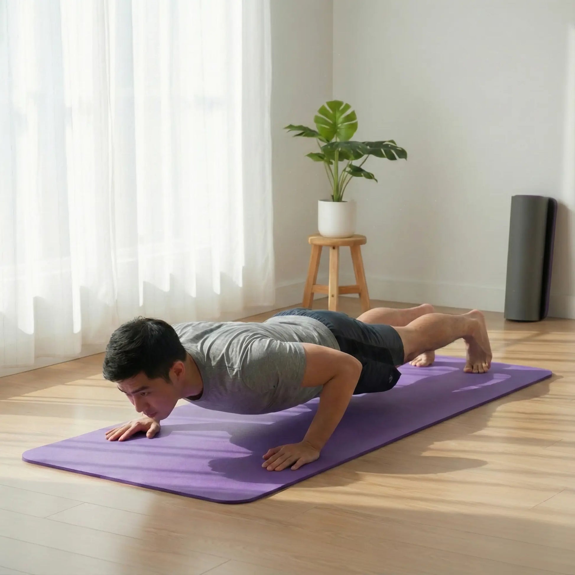 Person performing a push-up on a purple exercise mat in a bright, minimal room.