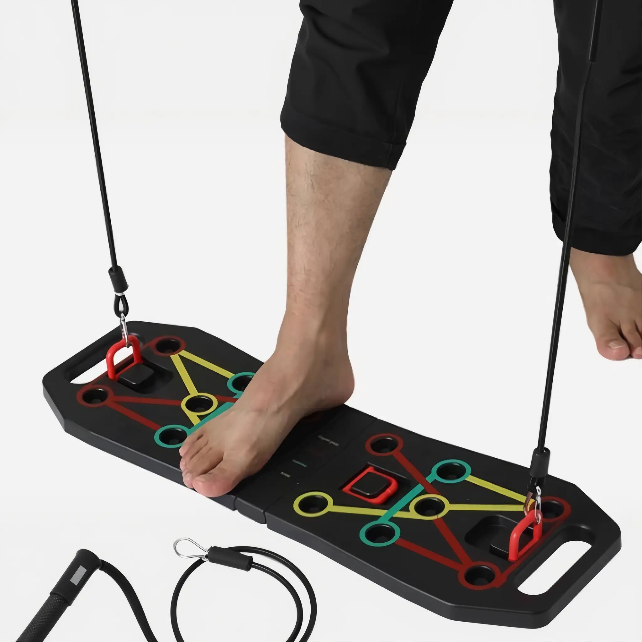 Foldable push-up board used with resistance bands for standing strength exercises