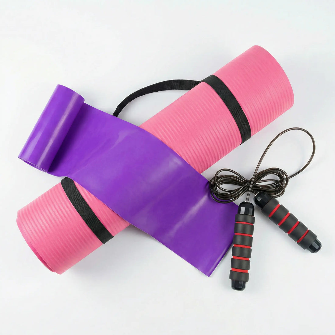 Home conditioning starter kit including exercise mat, skipping rope and light resistance band
