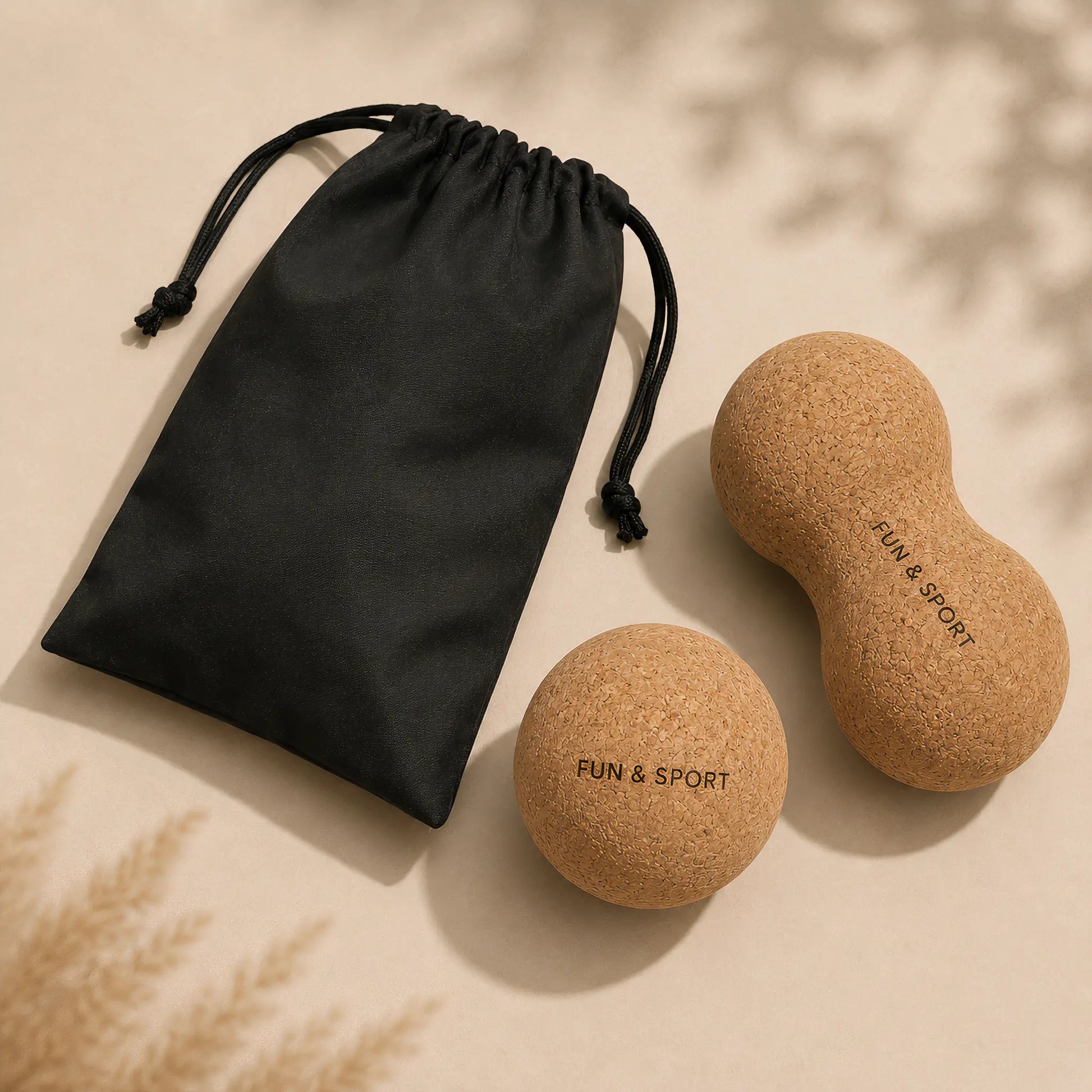 Cork massage ball recovery set with black drawstring carry bag