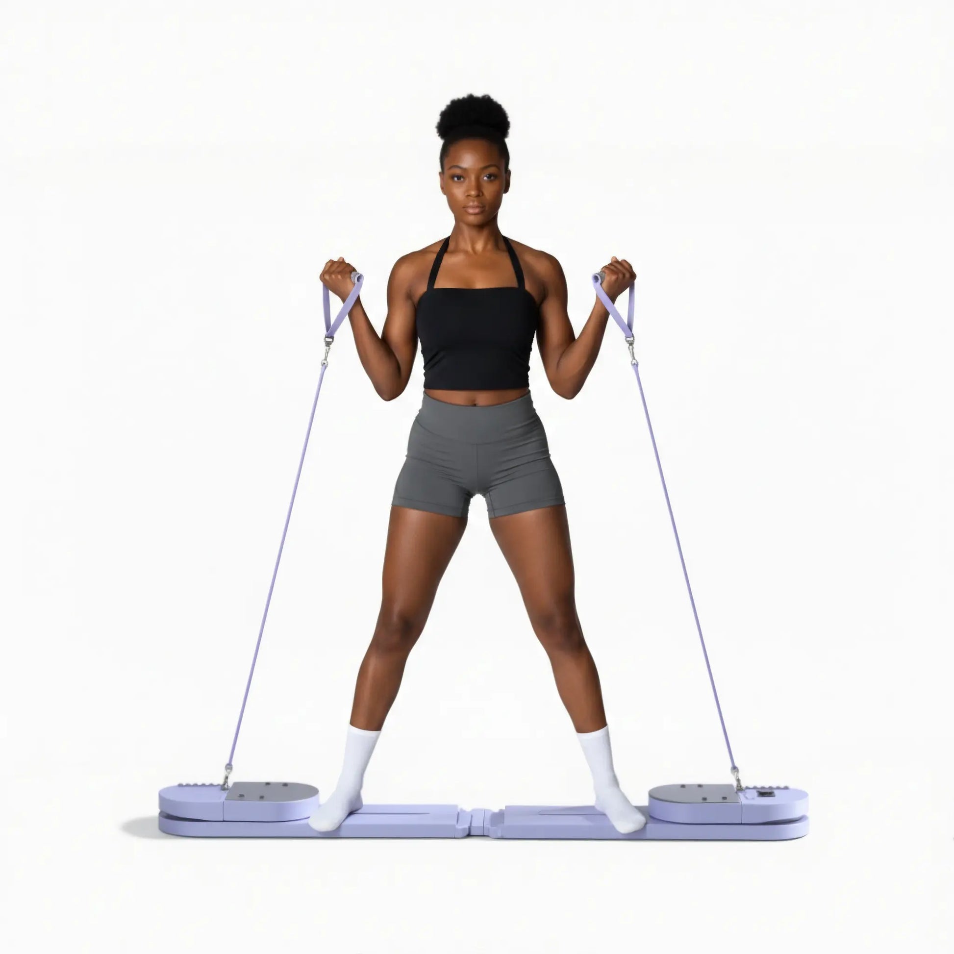 Pilates board with resistance handles for full-body Pilates-style movement