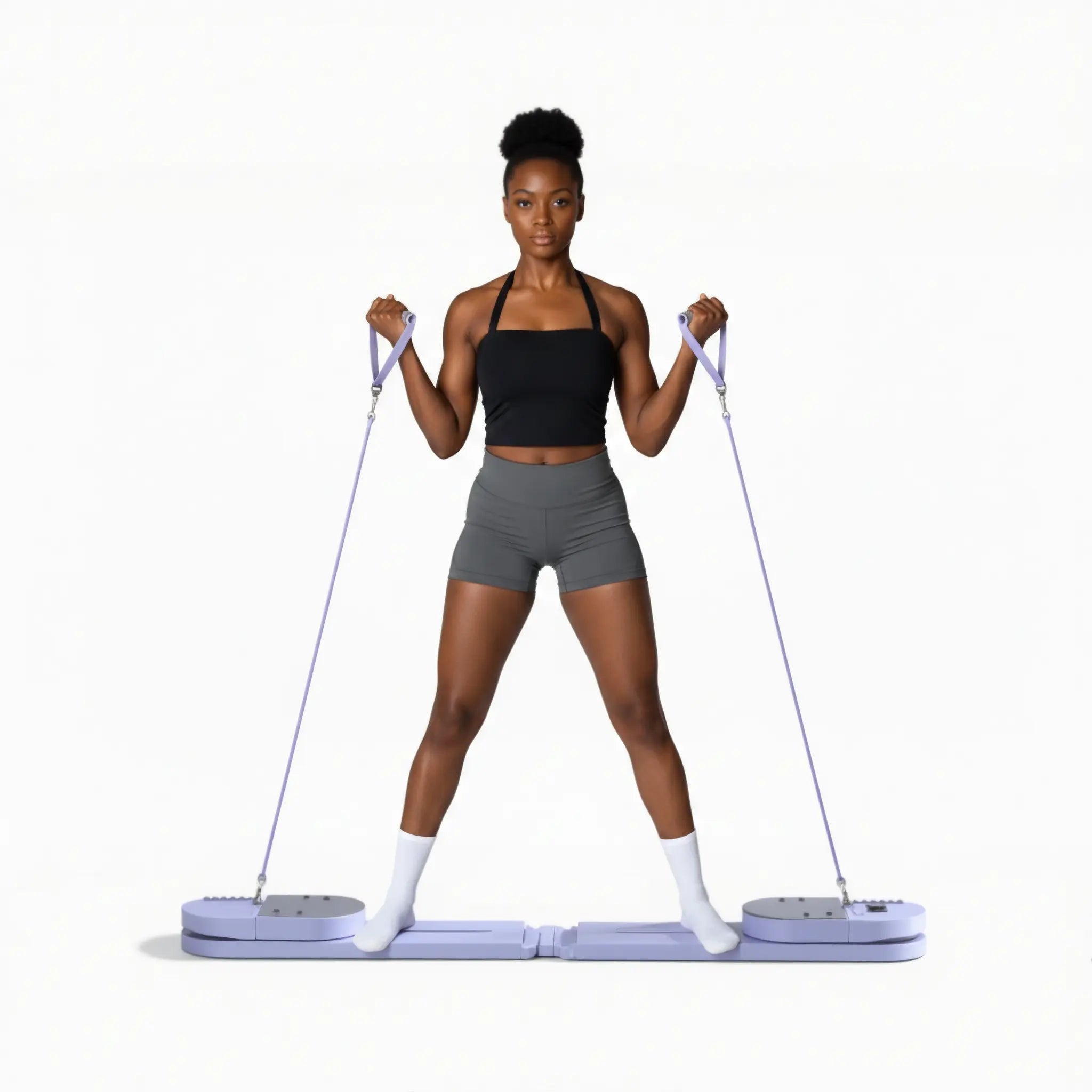 Pilates board with resistance handles for full-body Pilates-style movement