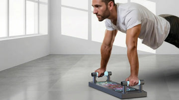 Man performing push-ups on a push-up board in a bright room.