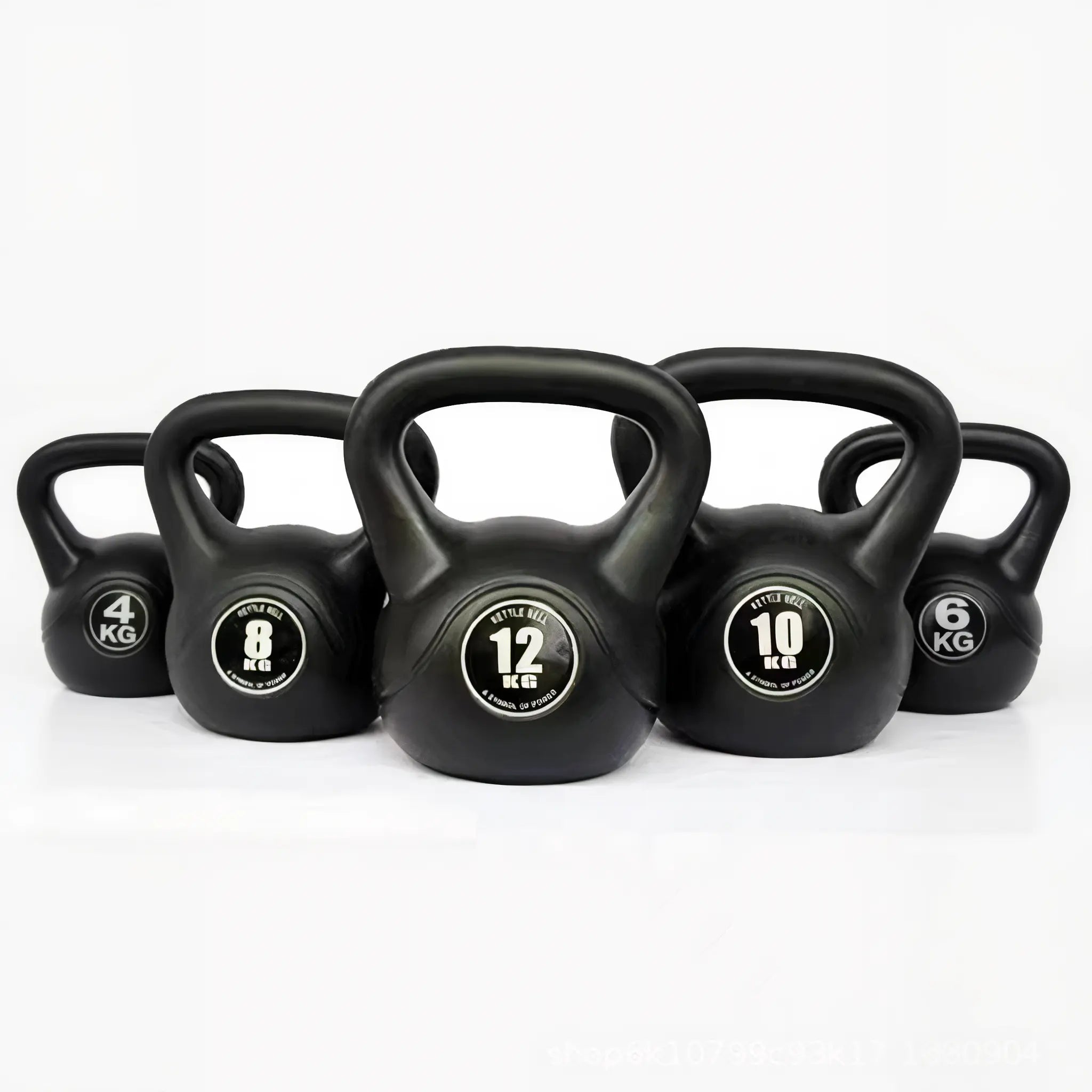 Set of black vinyl-coated kettlebells with weight markings on a white background